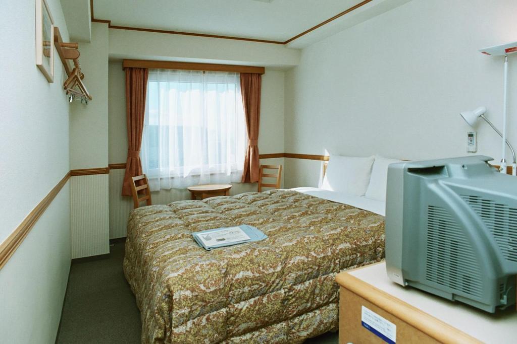 Toyoko Inn Saitama Shintoshin Rum bild